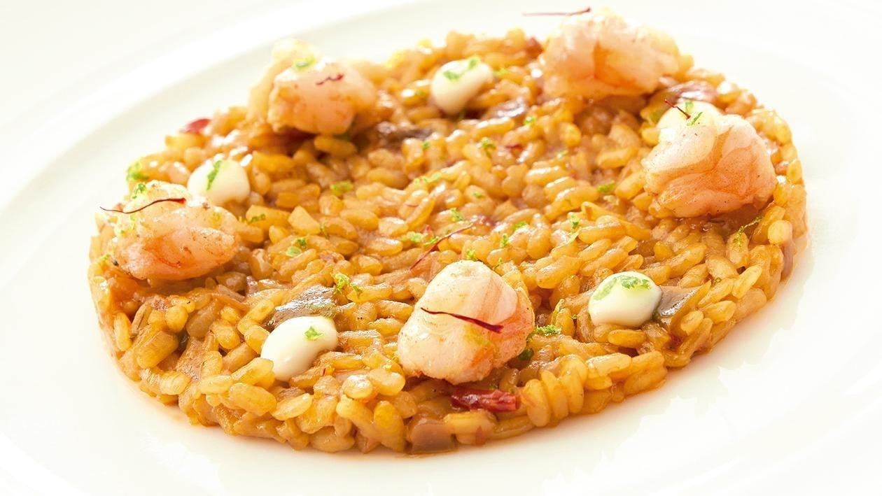 Arroz muy cremoso de langostinos, sofrito concentrado de tomate, azafran y alioli – - Receta