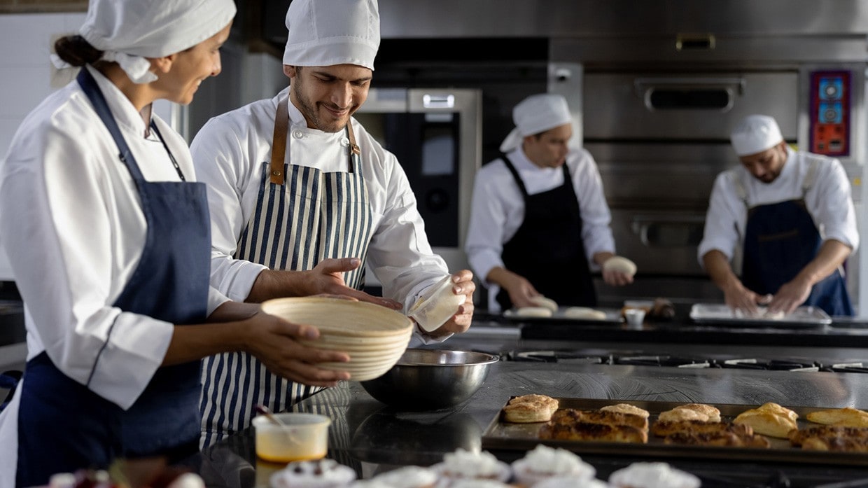 Grupo de Chef pasteleros